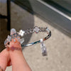 Silver four petals and crystal and shell mix  bangle