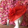 Large red headband hatinator with net & feather