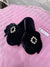 Black velvet slippers with diamanté detail