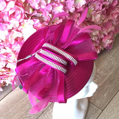 Cerise fascinator with diamanté & feather