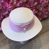 White hat with pink detail