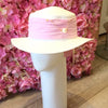 White hat with pink detail