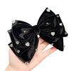 Crystal hearts velvet large bow hair clip in Black