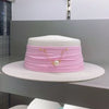 straw hat with Silk band and pearl detail in baby Pink