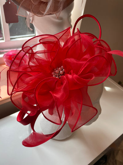 Medium red fascinator with feather detail