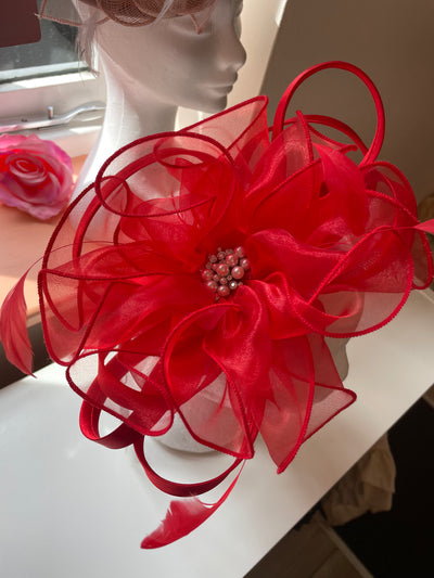 Medium red fascinator with feather detail