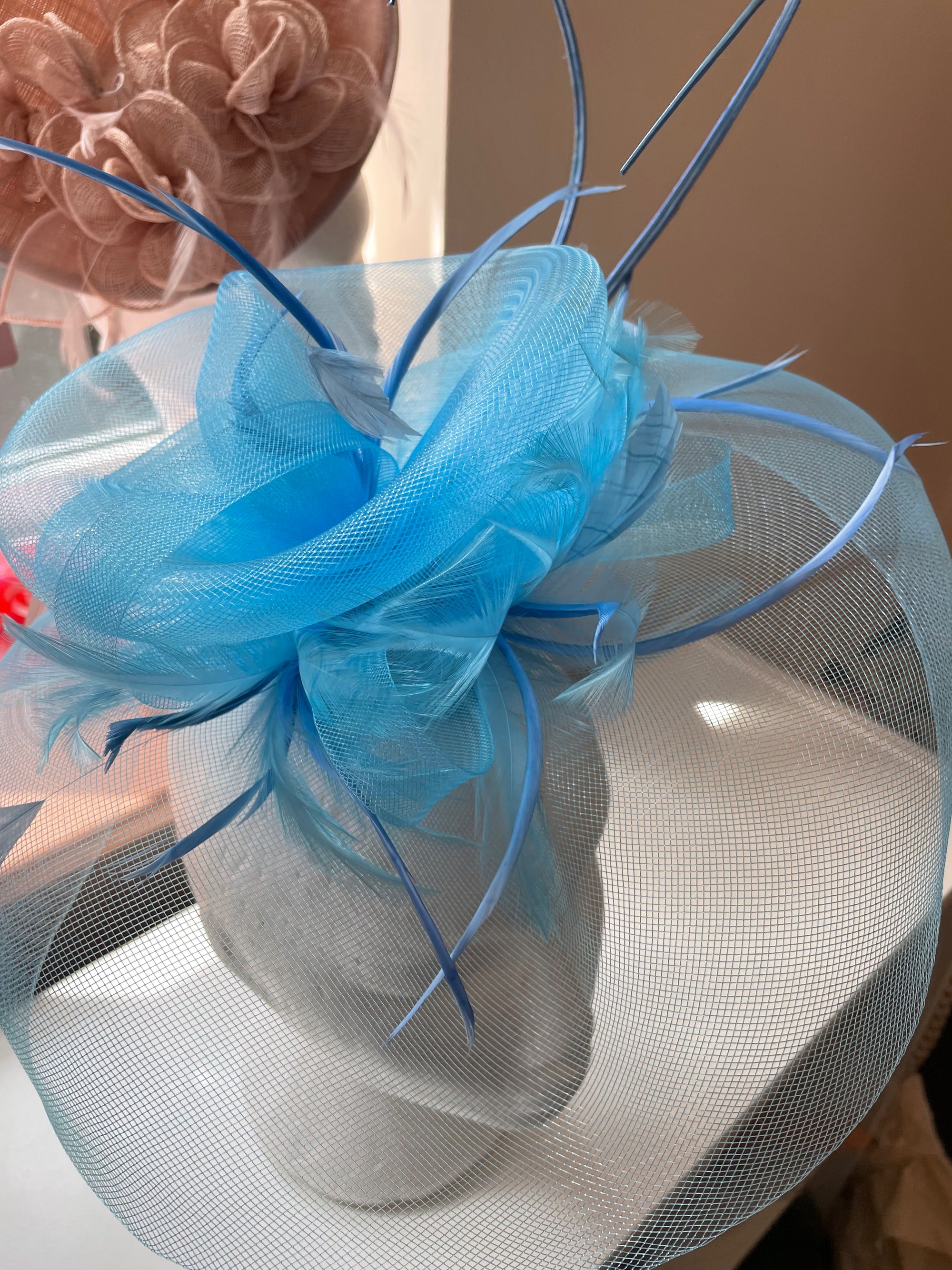 Medium aqua blue fascinator