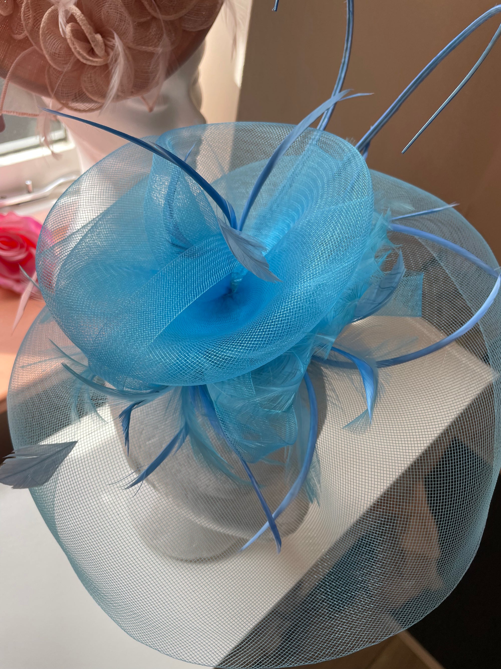 Medium aqua blue fascinator